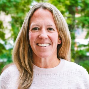 Sydney Parfet happy headshot in downtown Kalamazoo