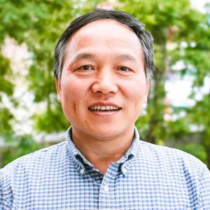 Xiaon-Li happy headshot in downtown Kalamazoo