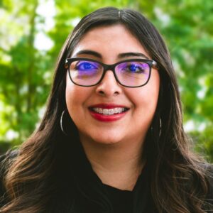 Lily Salas happy headshot in downtown Kalamazoo