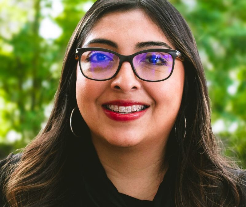 Lily Salas happy headshot in downtown Kalamazoo
