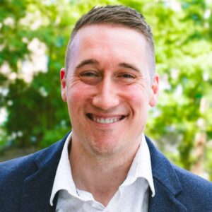 Todd Kuntz happy headshot in downtown Kalamazoo