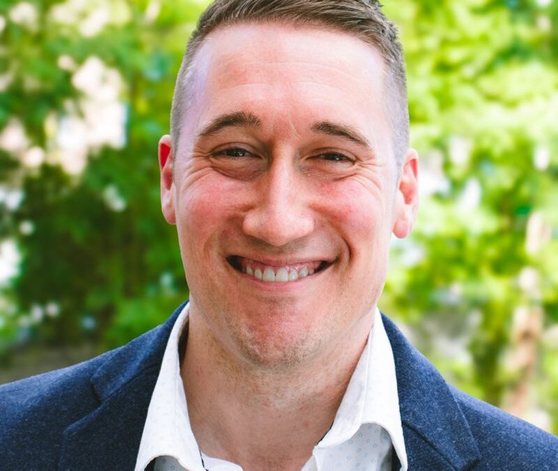 Todd Kuntz happy headshot in downtown Kalamazoo