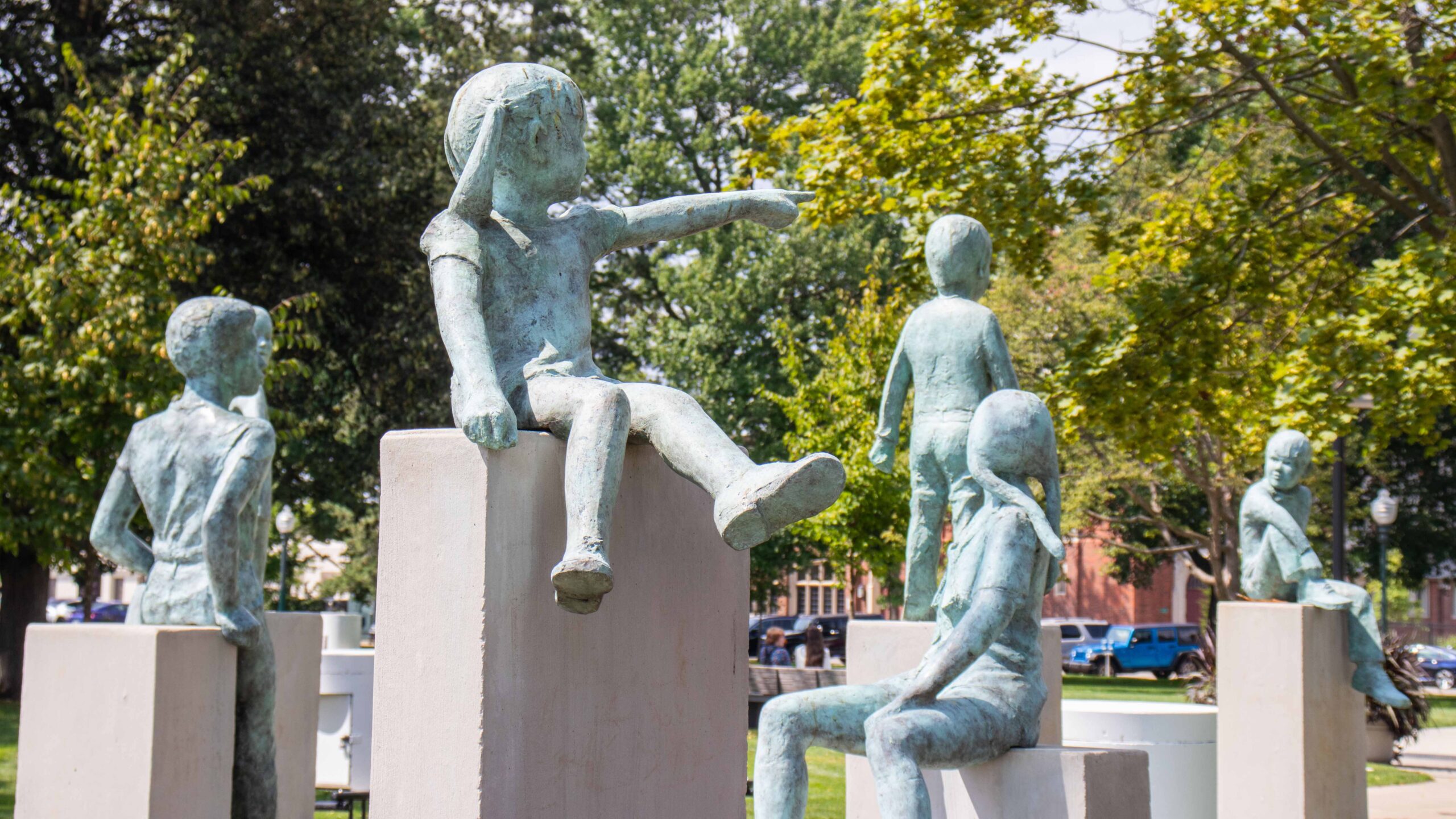Photos of children statues in Bronon Park