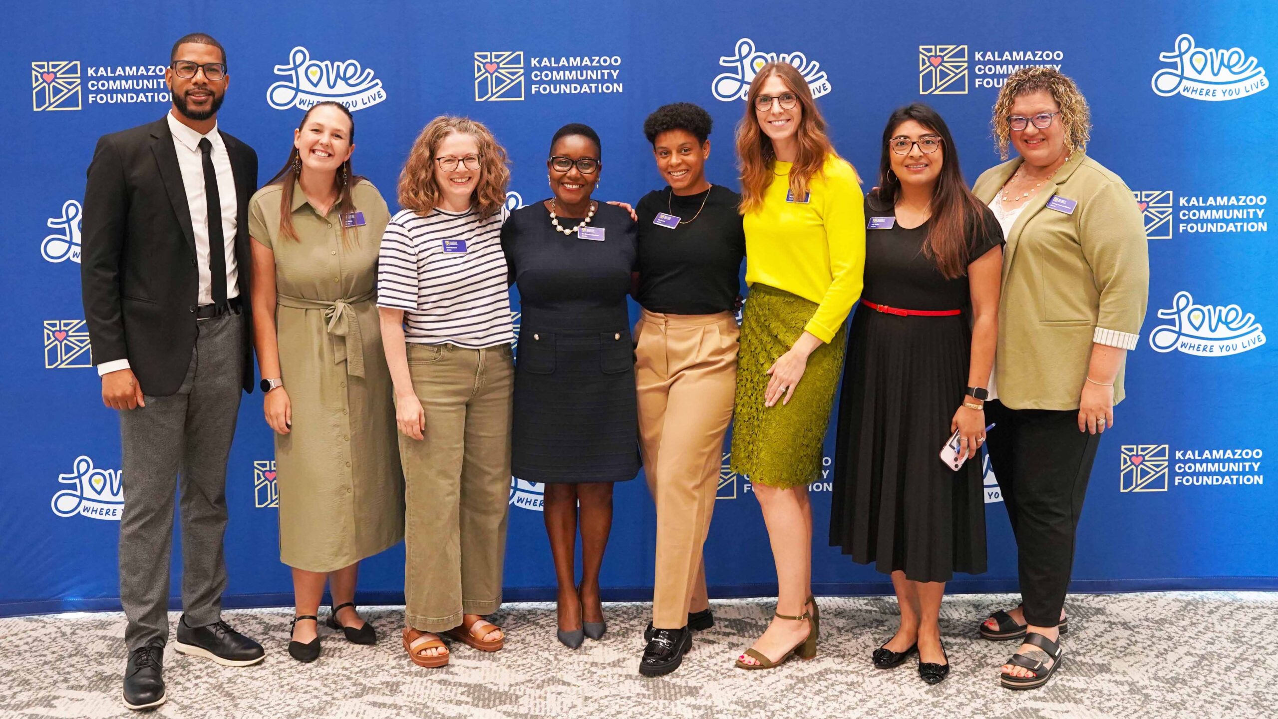 Photo of Community Impact team with president/CEO, Dr. Grace Lubwama