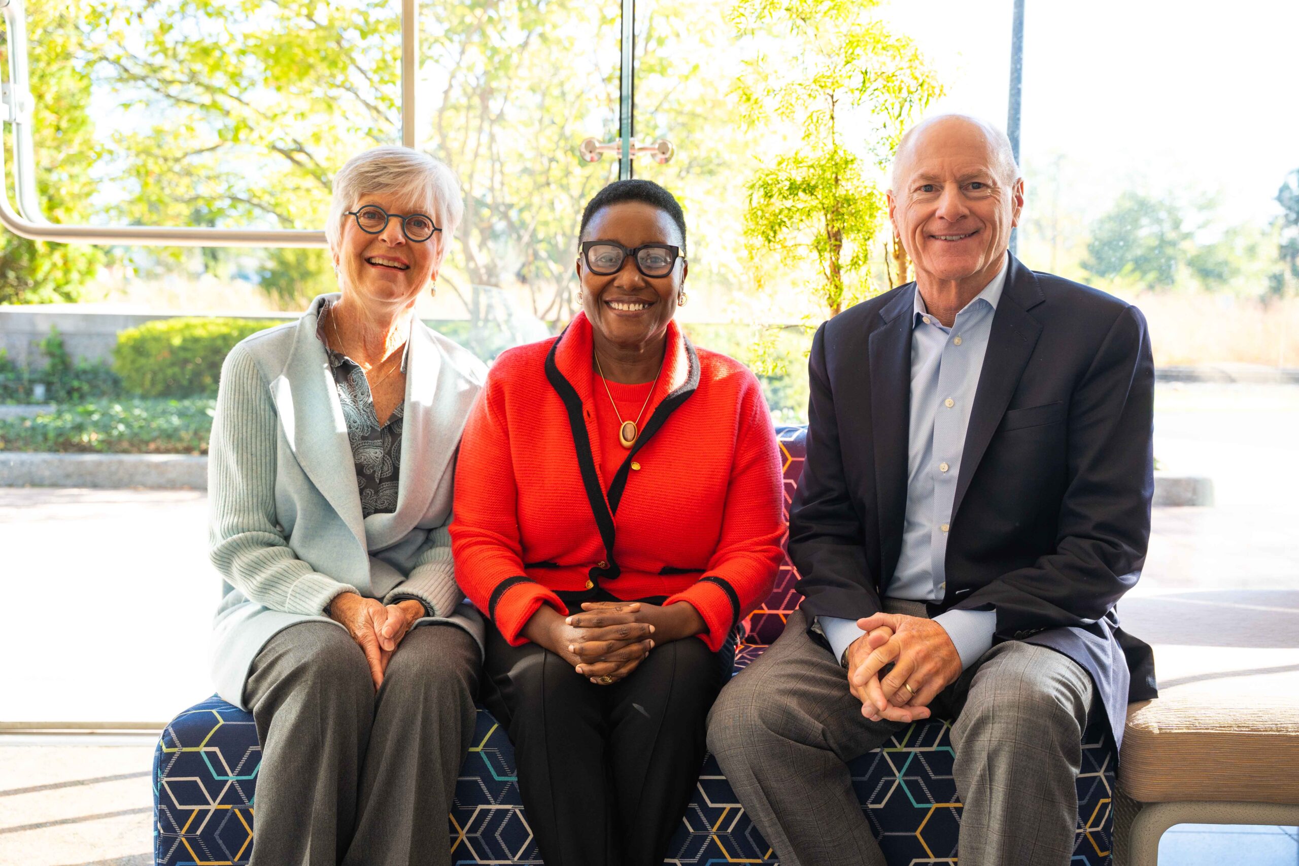 KZCF President/CEO, Dr. Grace Lubwama, with fundholders Si and Shirley Johnson